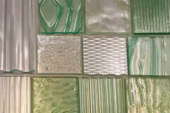 Kiln-formed decorative glass samples in green tint with ribbed, rippled and cast textures